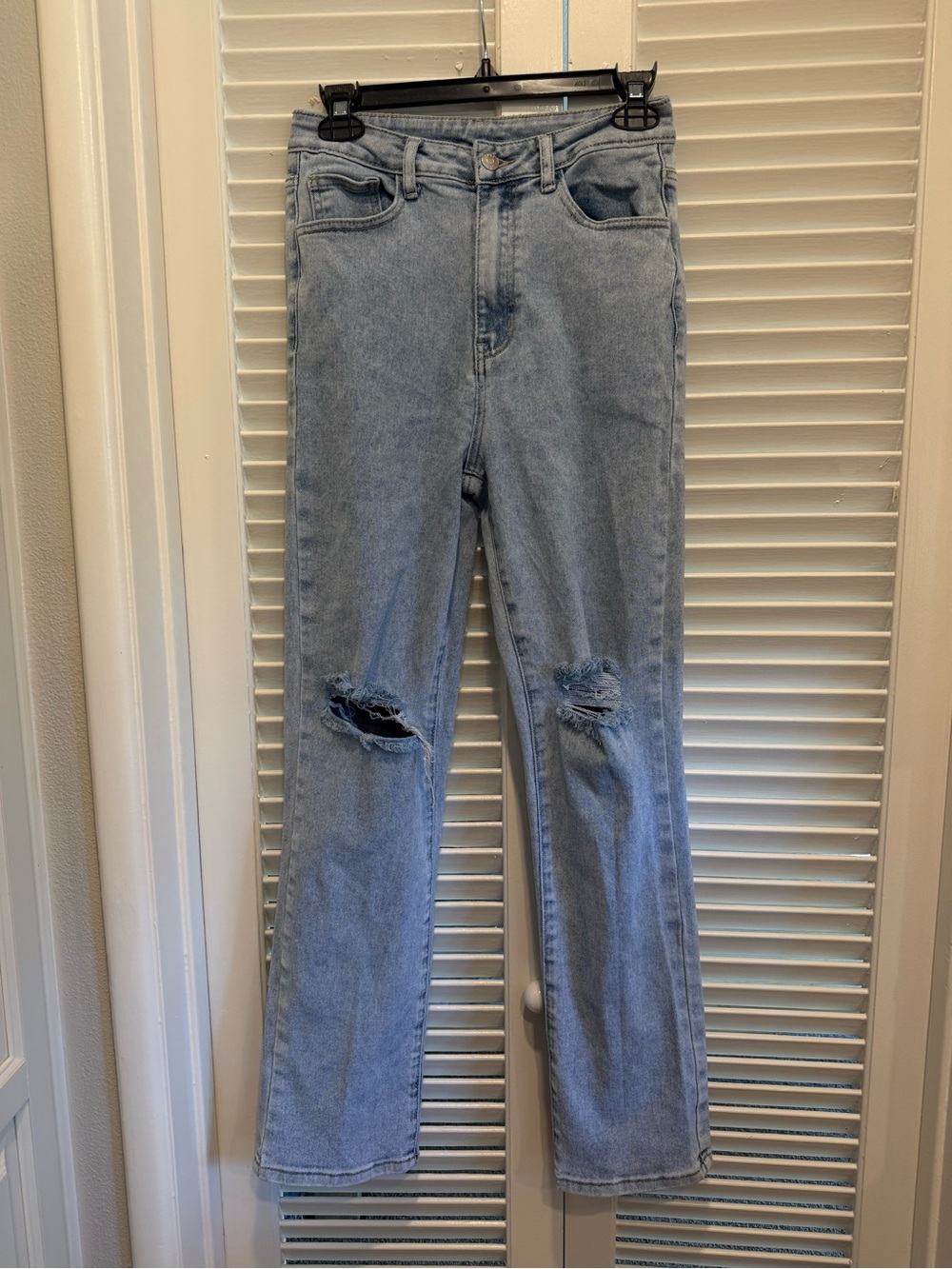 SHEIN Light Blue Distressed Women's Jeans with back rip.